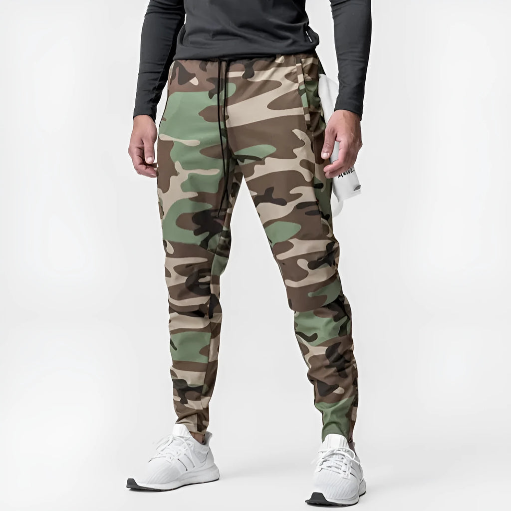 Men's grey quick-dry fitness trousers with ankle-tied design for gym workouts