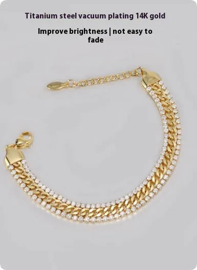 Gold tennis bracelet with artificial gemstone inlay on wrist, showing hip hop style unisex design