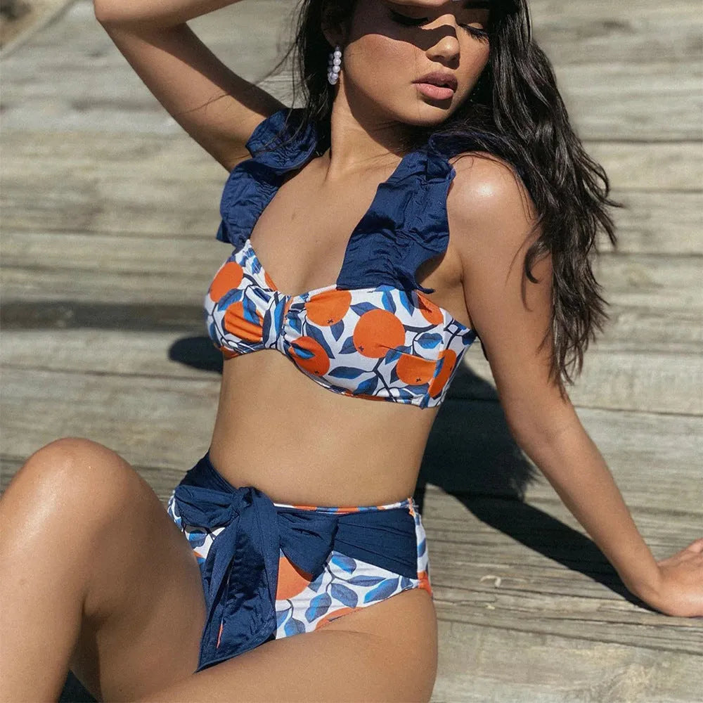 Women's blue leaf orange printed high waist bikini swimsuit on hanger