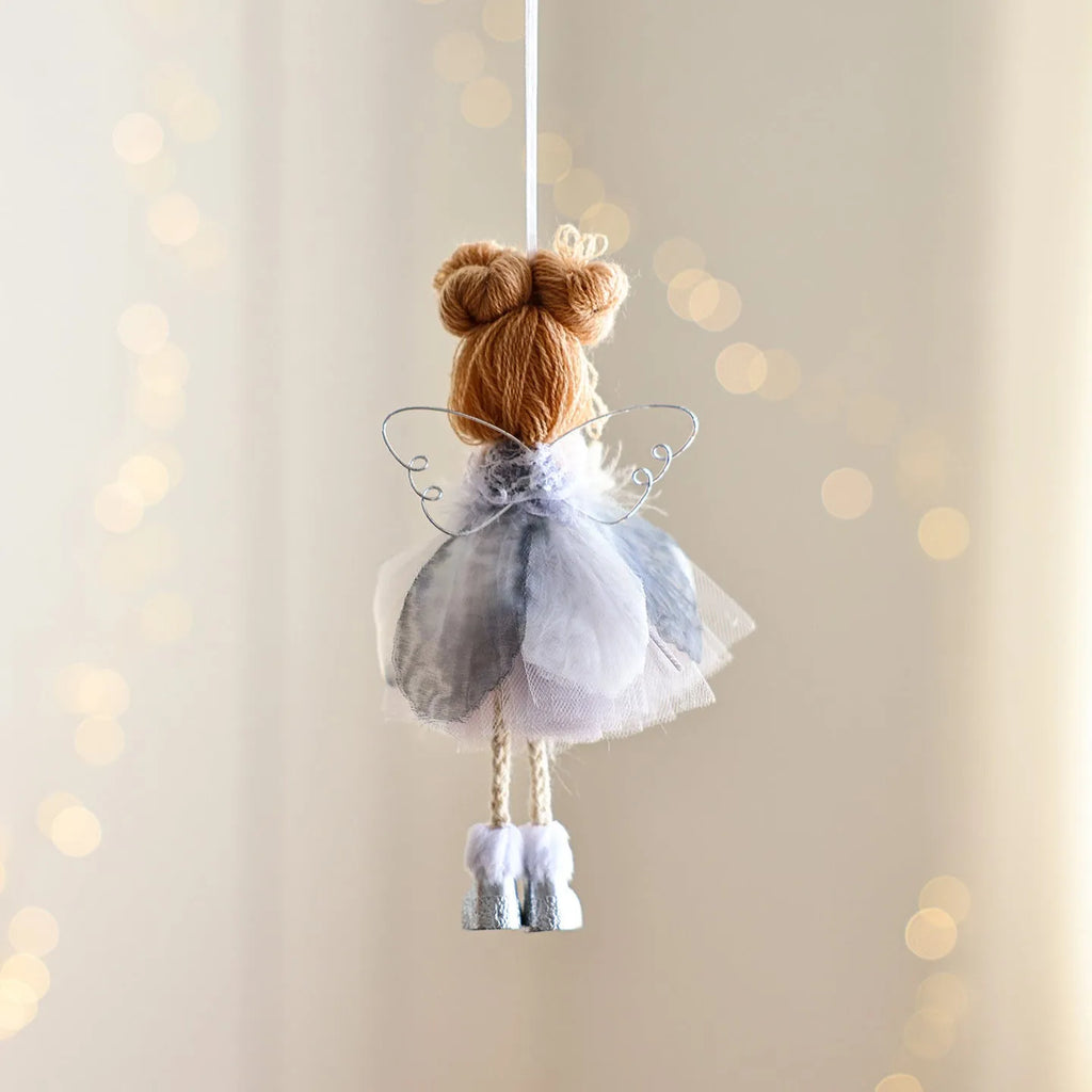 White Christmas tree hanging ornament with mesh angel girl design, snowflake styling, and metal, plastic, and cloth construction.