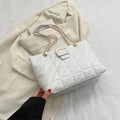 Women's soft PU shoulder bag with chain strap in trapezoid shape, black colour option