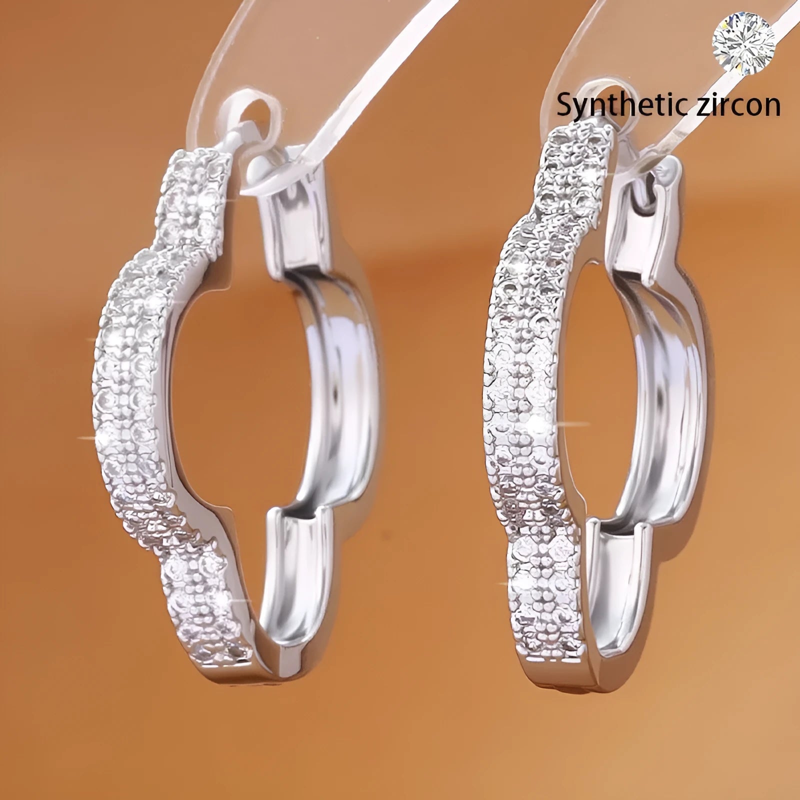 Gold copper heart-shaped earrings with micro-inlaid zirconia stones geometric design