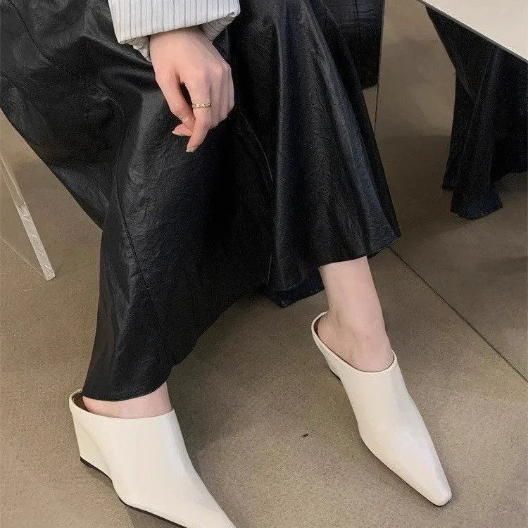 Women's Wind Wedge closed toe half slipper in PU leather, showing wedge heel design.