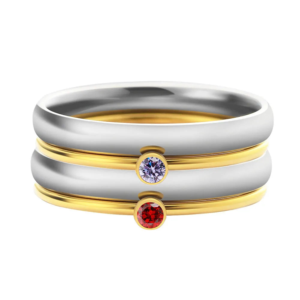 December birthstone engraved titanium steel ring with gold electroplating on geometric band.