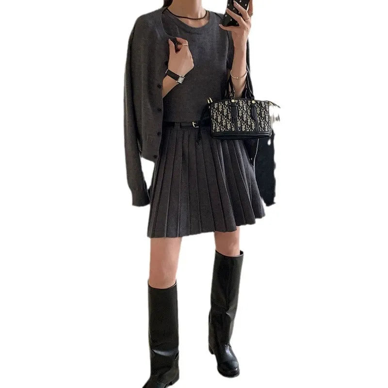 Grey art retro knitted vest skirt and long-sleeved cardigan two-piece set for women.