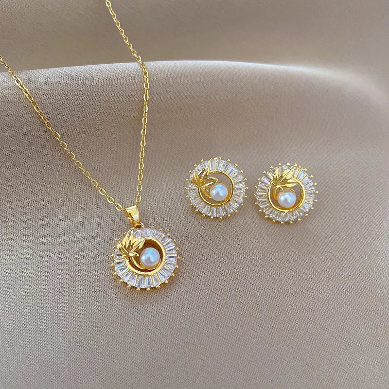 Brass leaf design jewellery set with titanium steel chain necklace and matching stud earrings