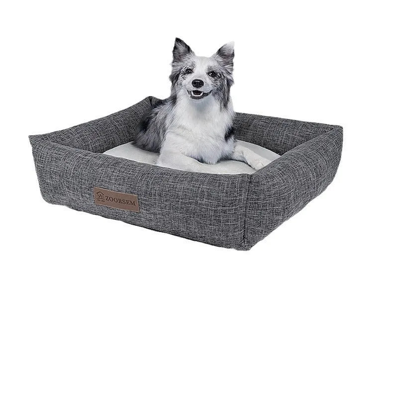 Square grey linen dog bed for a medium-sized dog.