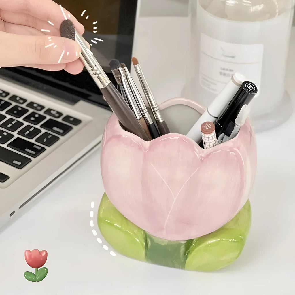 Ceramic floral pen holder storage box with pink tulip design on desktop