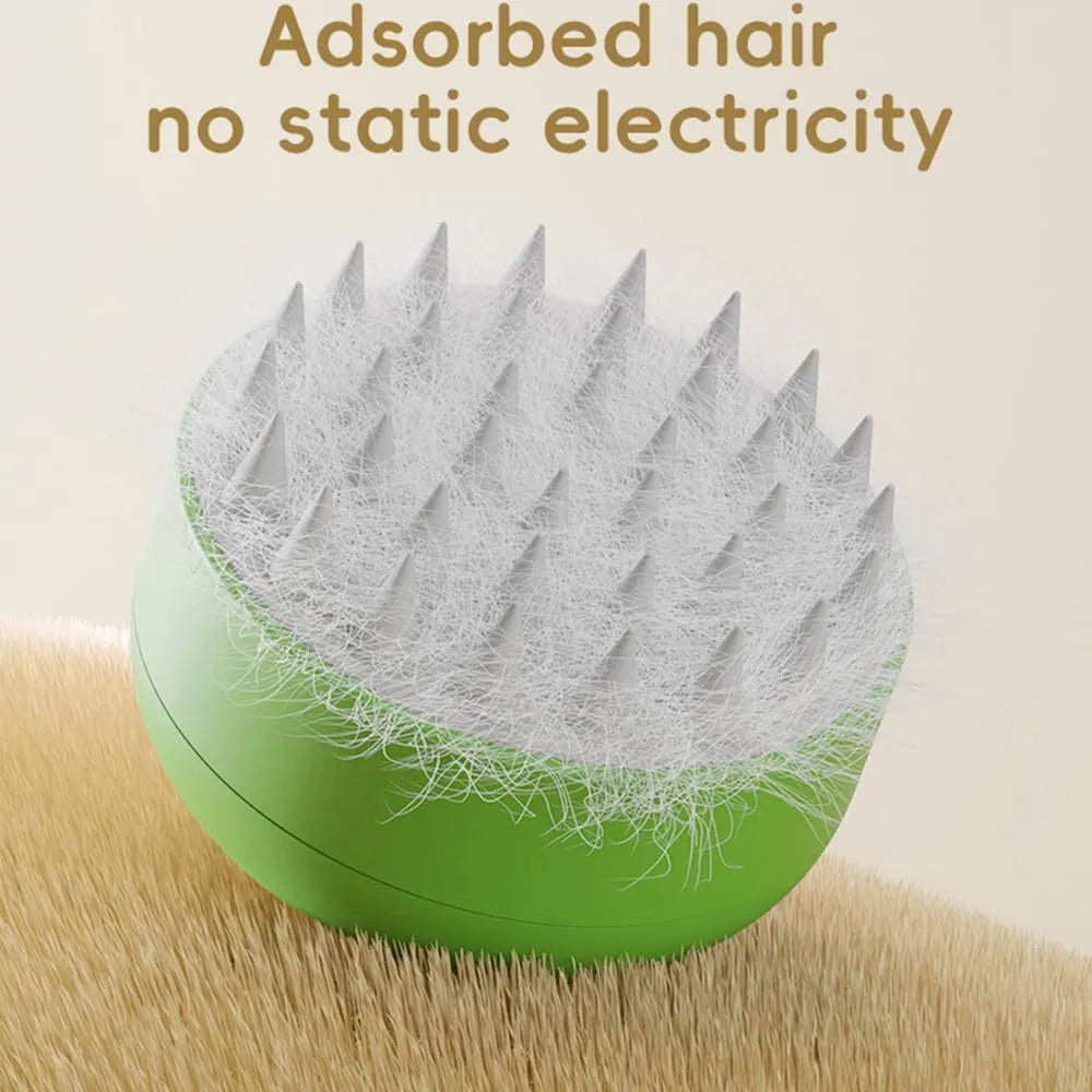 Green and yellow rechargeable cat steam brush with silicone bristles for pet grooming and massage.