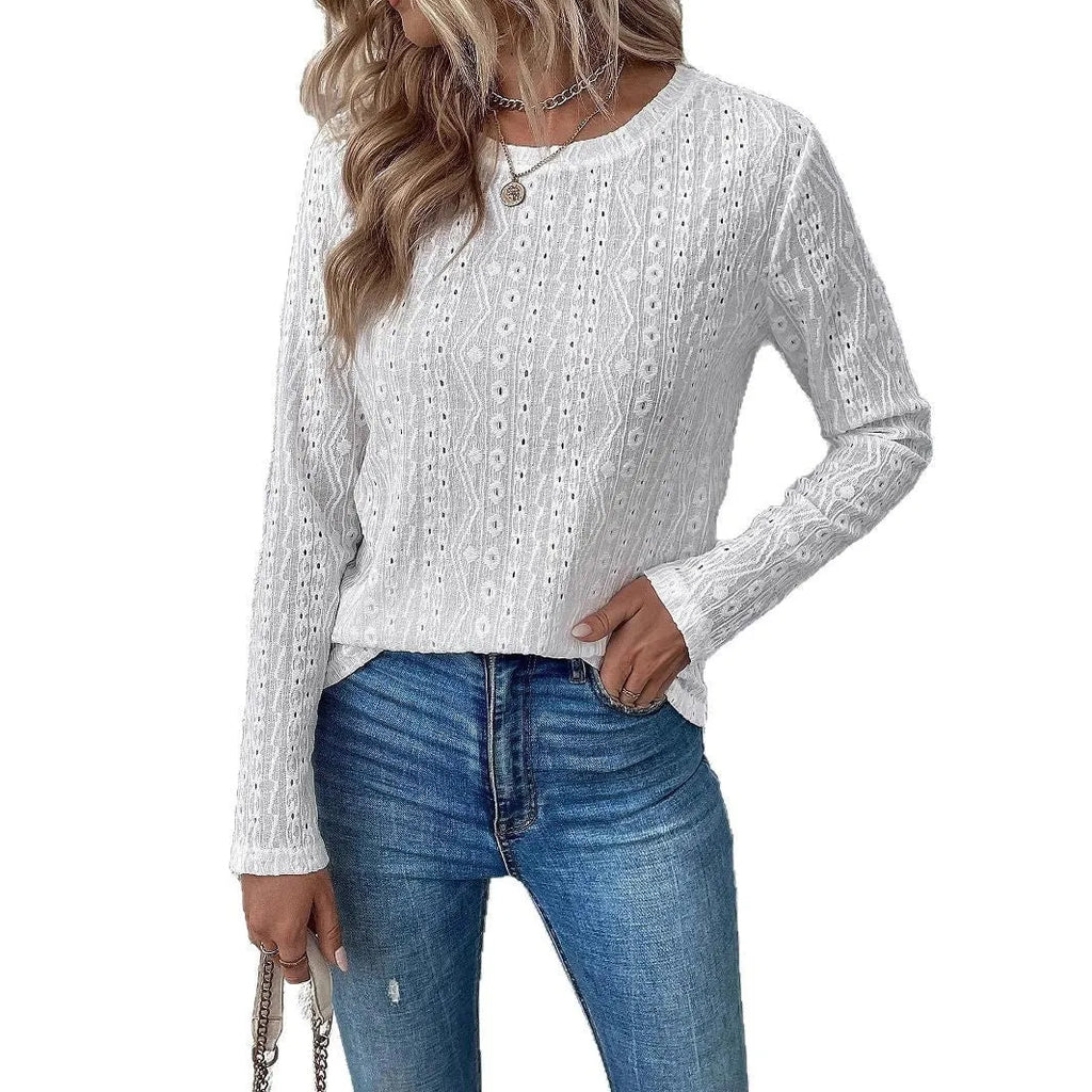 White loose fit long sleeve round neck polyester pullover top laid flat