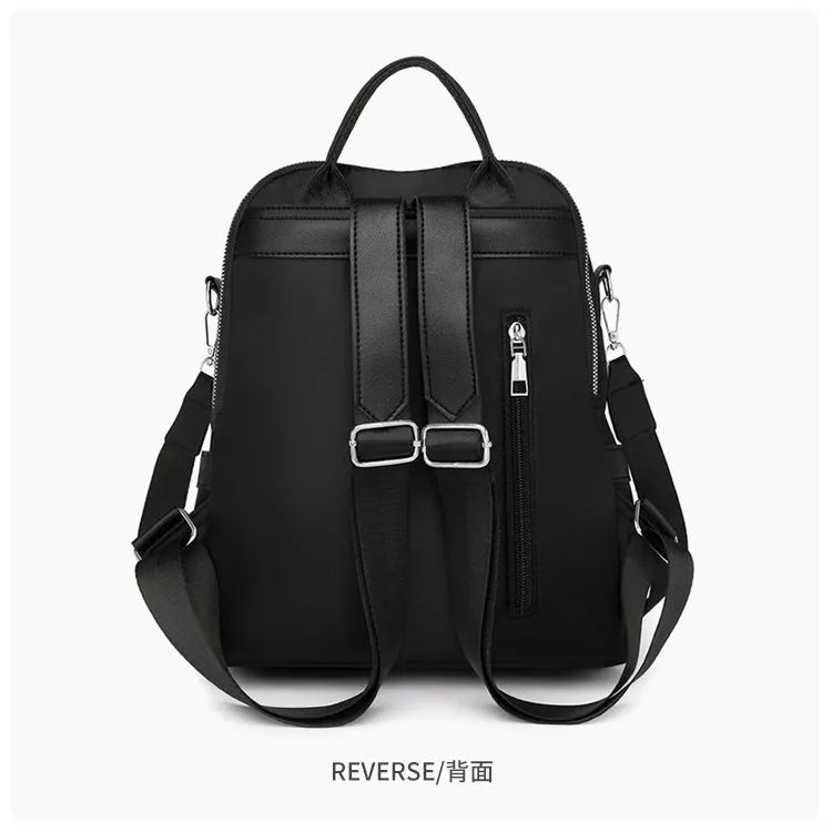 Soft PU backpack in black colour showing three-dimensional pocket and urban simplicity style