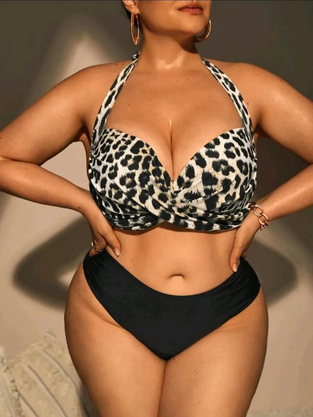 Plus size high waist leopard print bikini set with split top and shorts, showing the nylon and spandex fabric