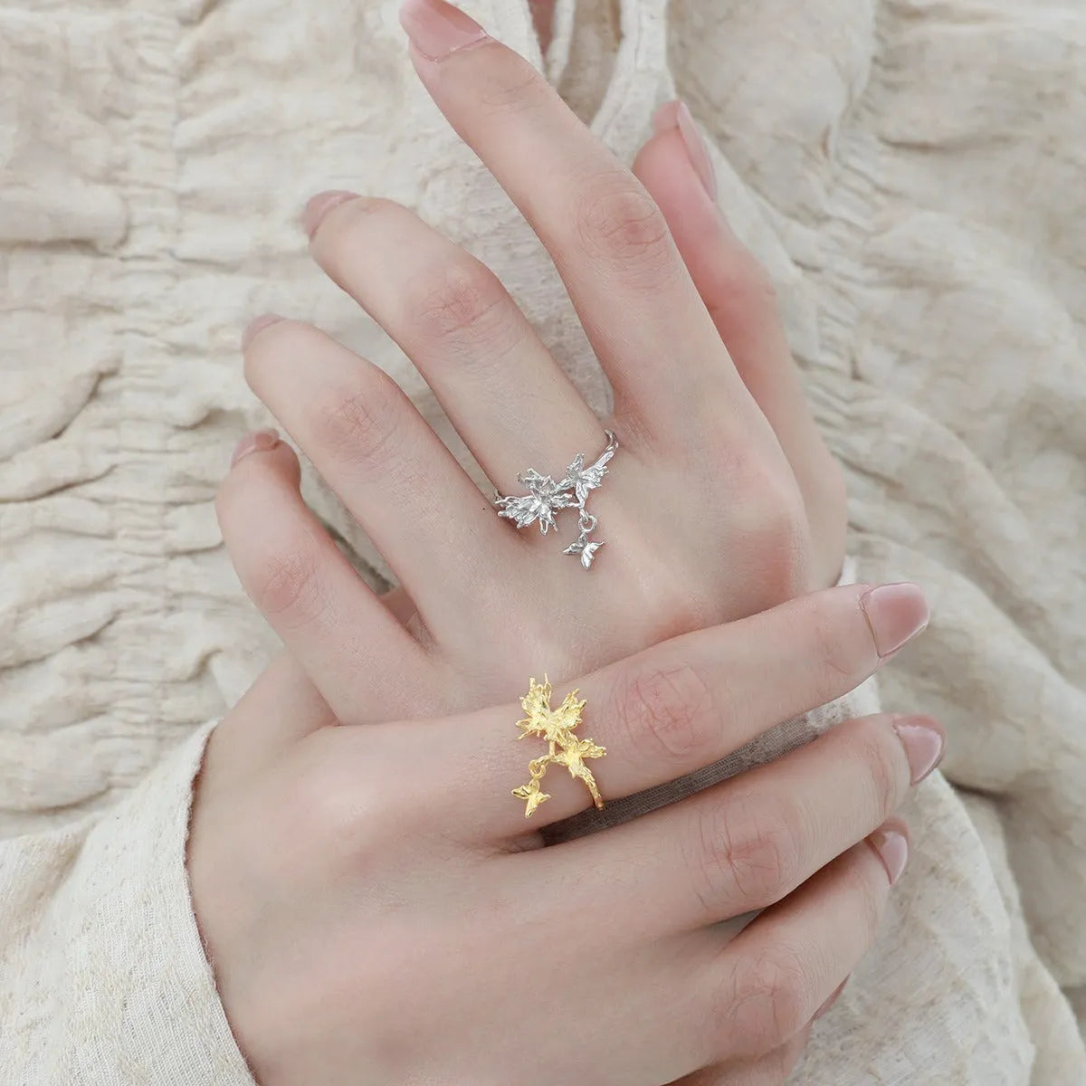 Silver adjustable open ring with butterfly design in 18K gold and white gold electroplated finishes