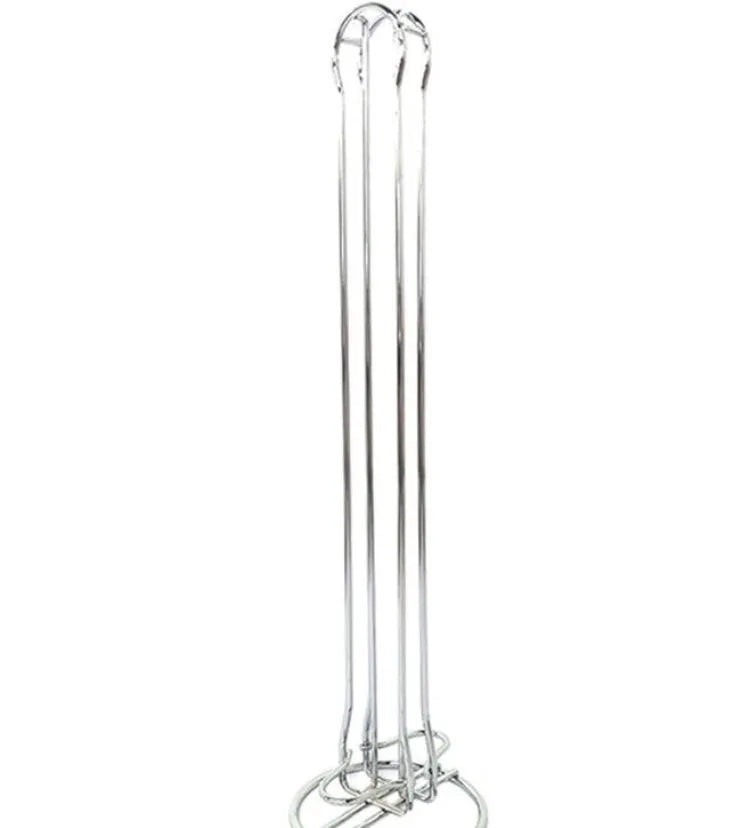 Black wrought iron coffee capsule storage rack holding 20 pods on display shelves.