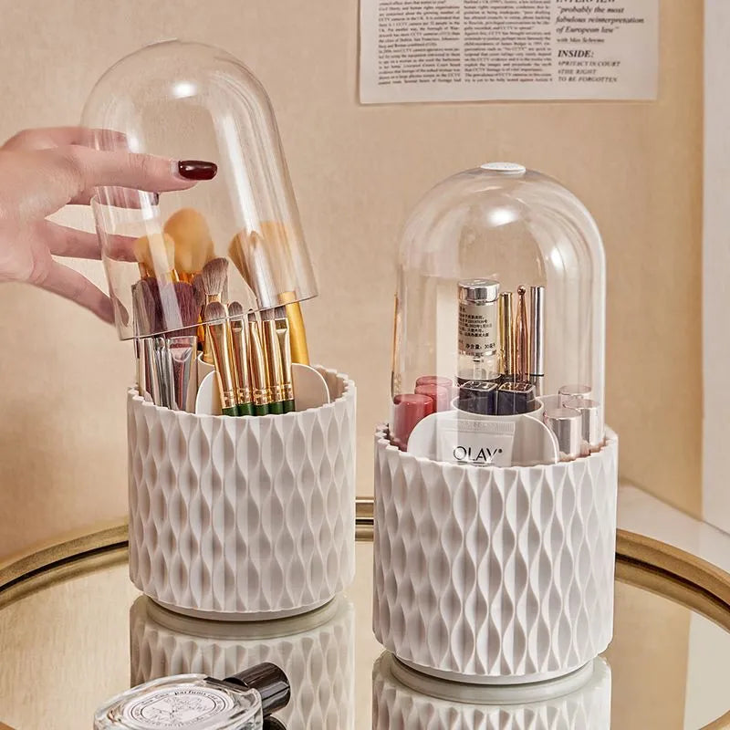 White rotating makeup brush storage box with transparent dust-proof cover on desktop