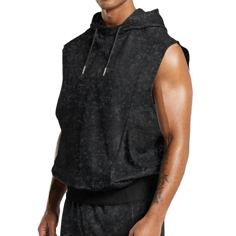 Men's distressed floral sleeveless hooded top in cotton blend, green colour, front view with hood and 3D patch pocket