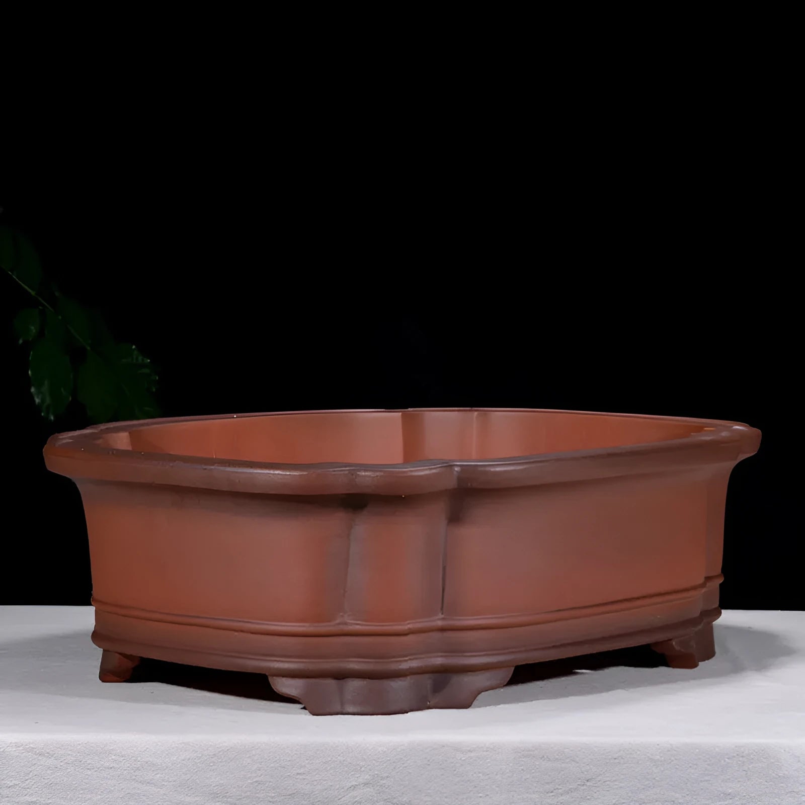 Large Chinese style purple clay flowerpot with antique jade finish and tree stump decoration