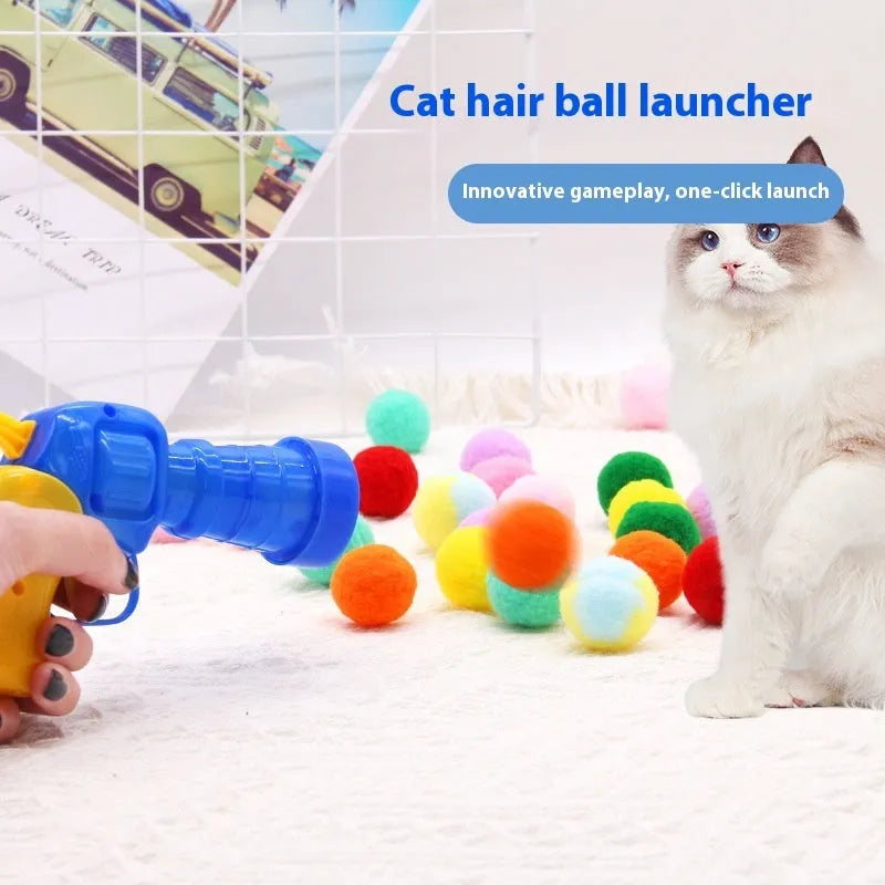 Pet toy launching gun with soft plush yarn balls for interactive dog play