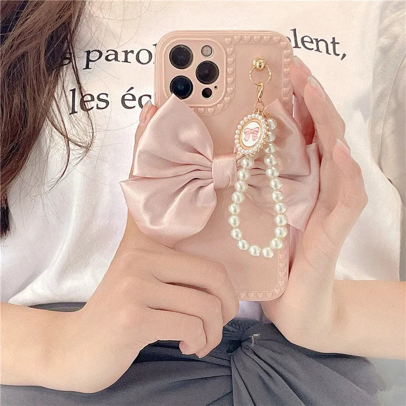 Bowknot pearl chain TPU phone case for iPhone in beige solid colour rear cover style
