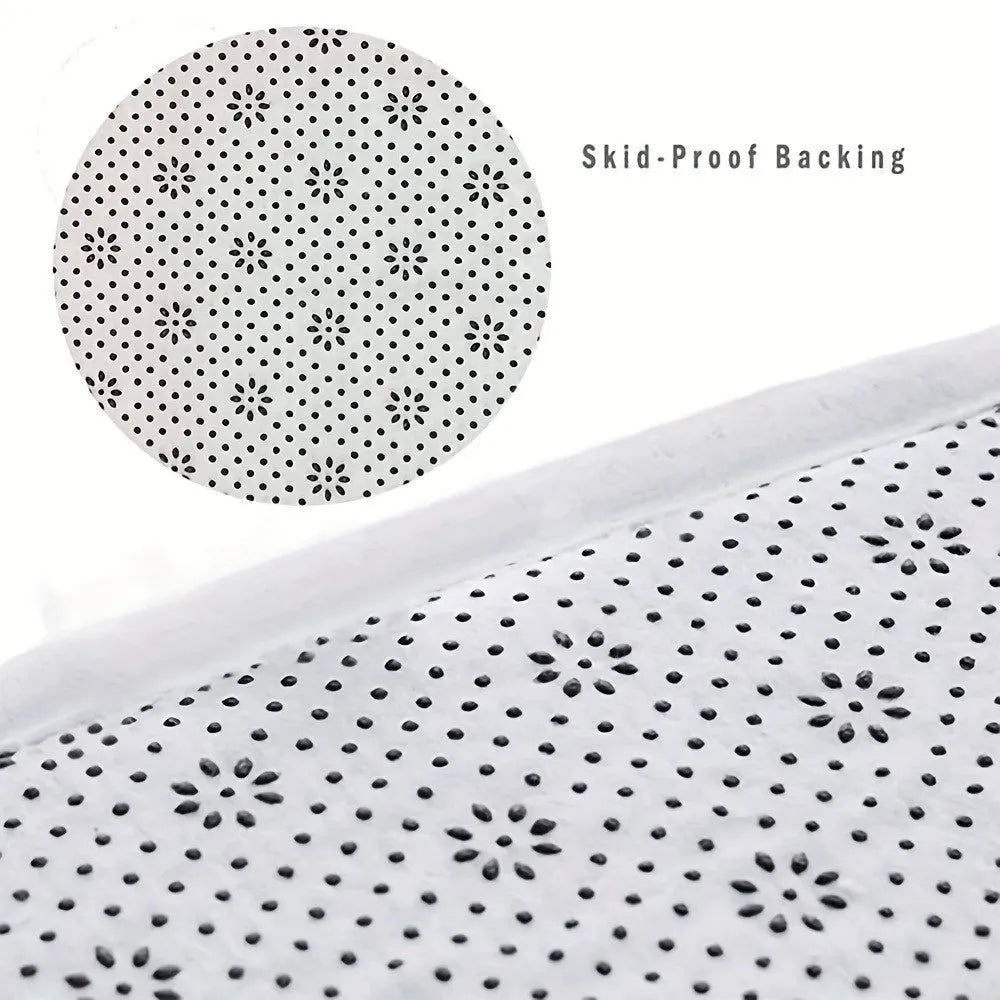 Square modern pattern flannel flocking carpet measuring 45 by 75 centimetres.