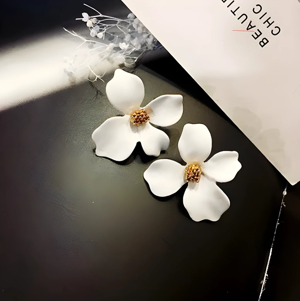 Floral stud earrings for women in white and pink colours with electroplated alloy material