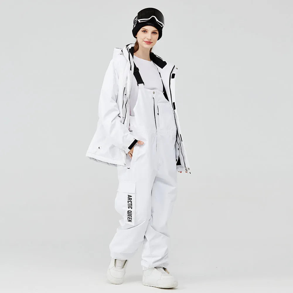 Blue and black two-piece ski suit for men and women on snowy mountain background
