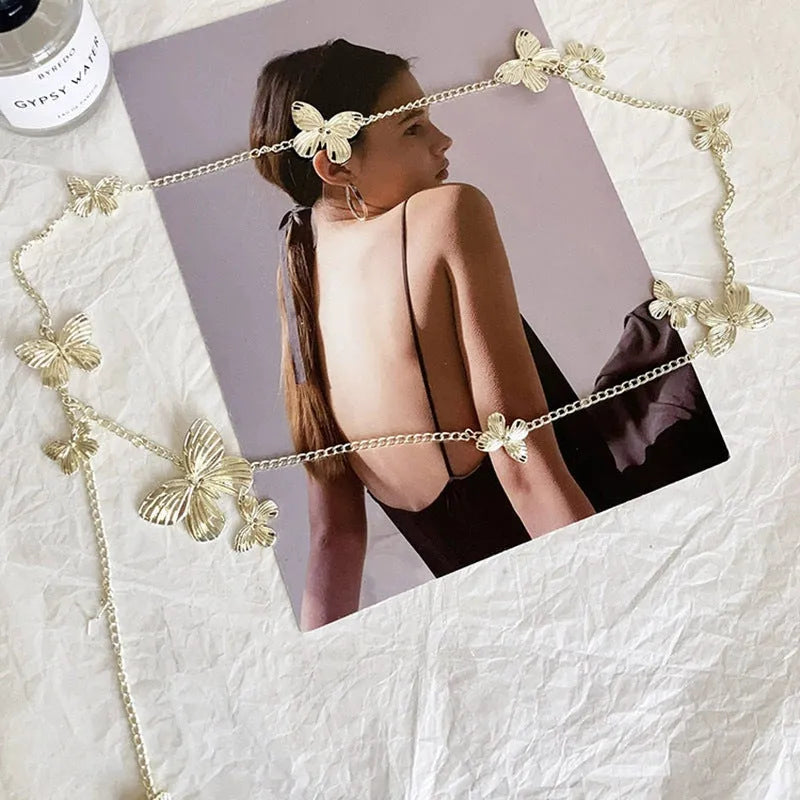 Gold and silver alloy waist chain with butterfly design measuring 104cm length