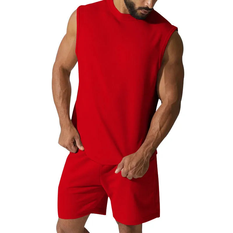 Men's sleeveless cotton blend sports set showing top and shorts in a solid colour.