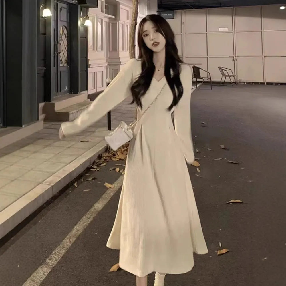 Women's white V-neck polyester knitted suspender dress with princess sleeves