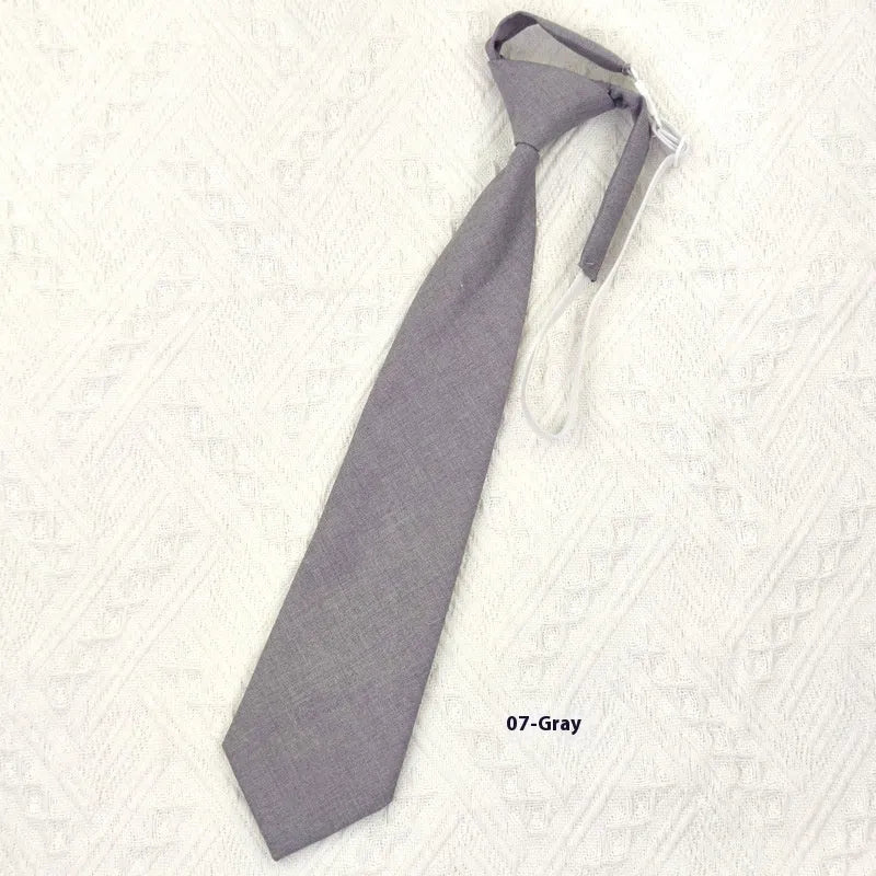 Men's navy blue cotton bow tie with arrow-style design measuring 35cm by 7cm
