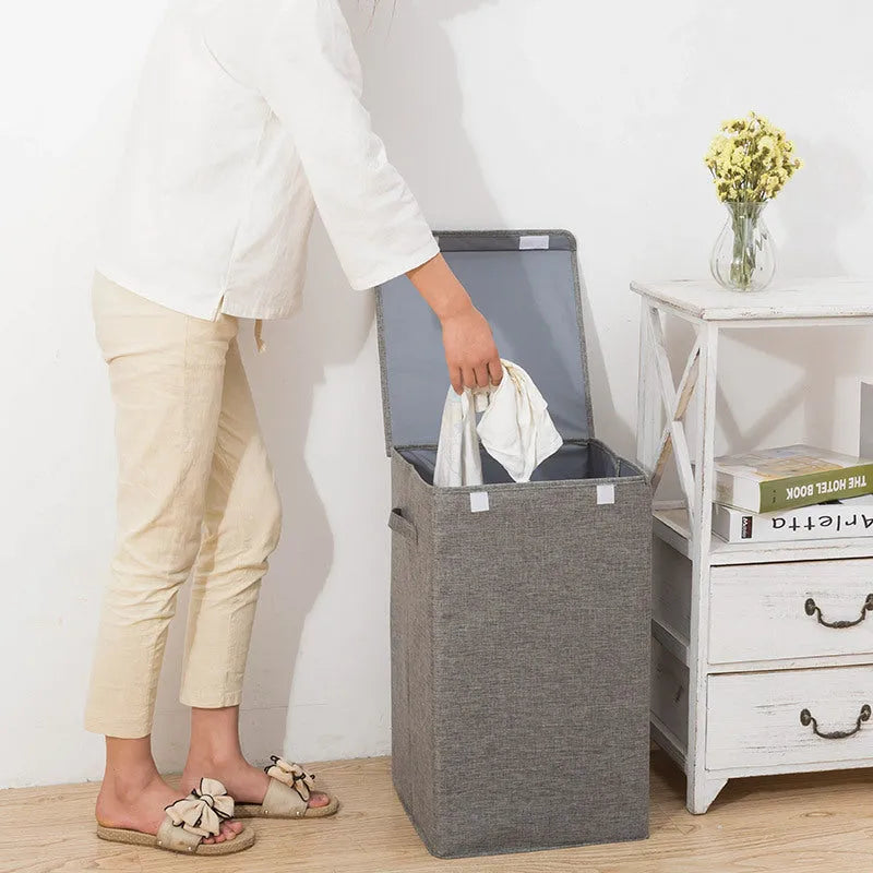 Foldable cotton linen storage basket in grey colour showing three-dimensional shape.