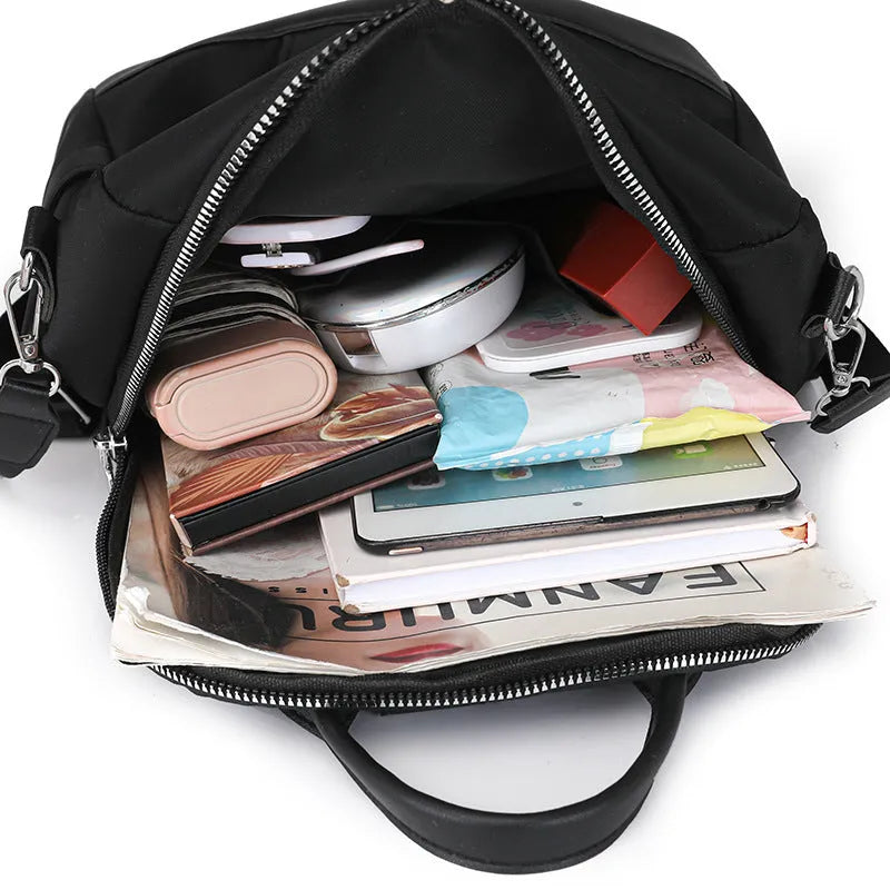 Soft PU backpack in black colour showing three-dimensional pocket and urban simplicity style