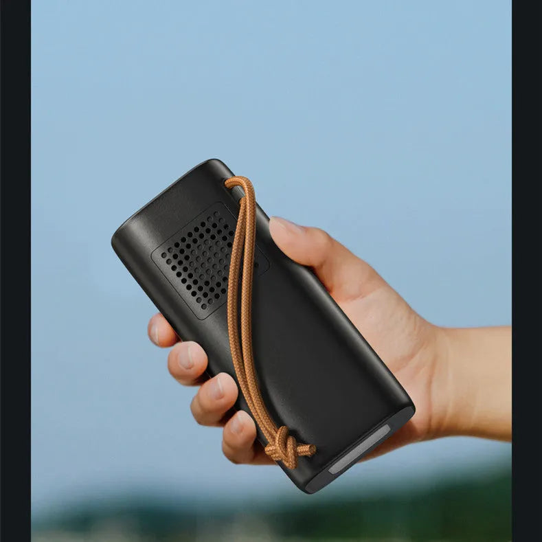 Black portable power bank with solar panel, 20000mAh capacity, and 200W maximum output power