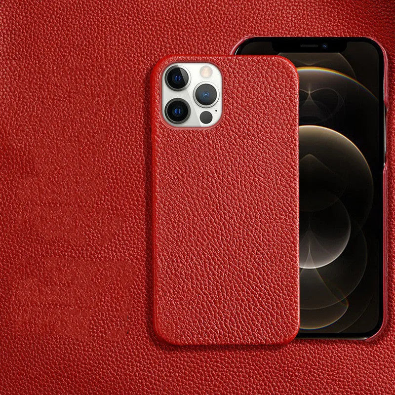 Genuine leather protective case for Apple iPhone in a selection of colours on a table.