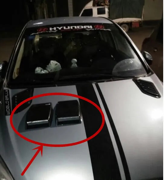 Car dashboard decorative vent accessory in ABS plastic showing black, white, and silver colour options