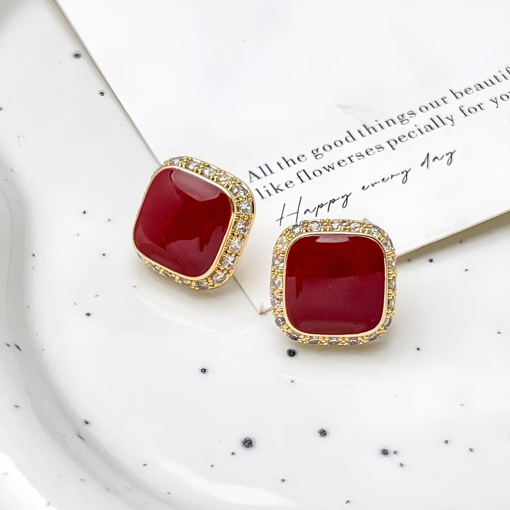 Red square geometric earrings with inlaid design on alloy base