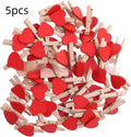 Set of five wooden heart-shaped clips in red, white, pink, yellow, and rose red colours.
