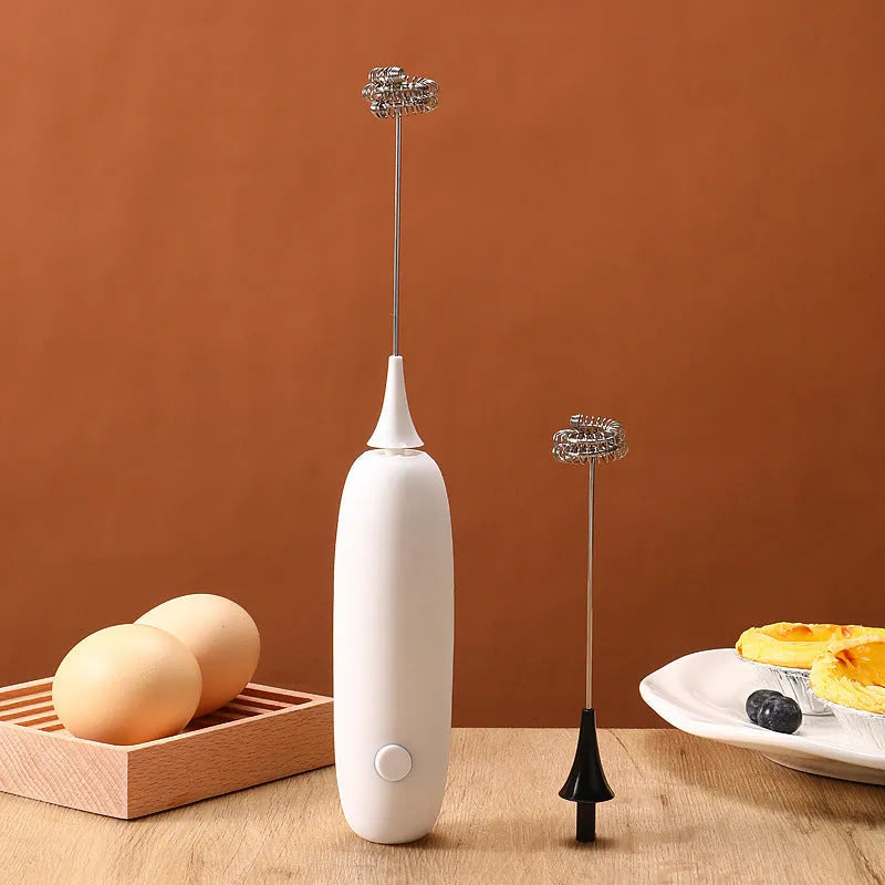 Black and white hand-held electric milk frother blender with modern design