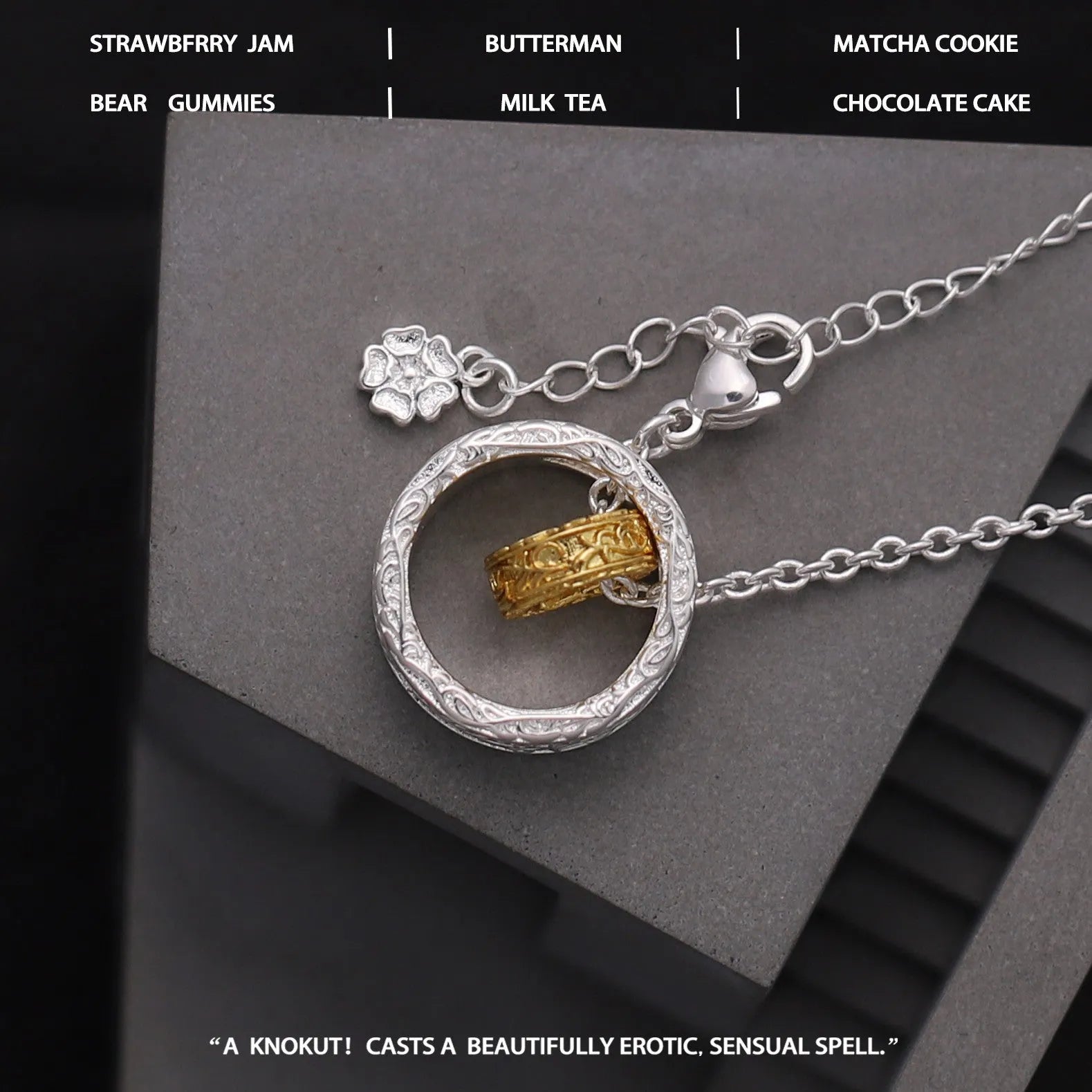 Geometric copper nested necklace with gold and silver electroplated finish, round and ring elements, on display