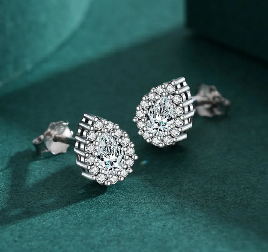 Women's silver water drop ear studs with diamond finish and 925 sterling silver construction