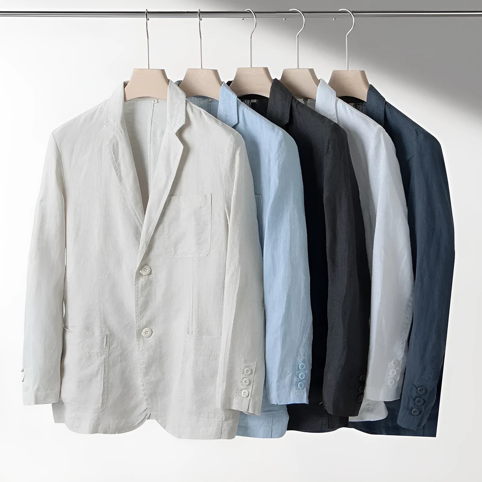 A man's casual linen suit jacket in a solid colour, shown with long sleeves and a loose fit.