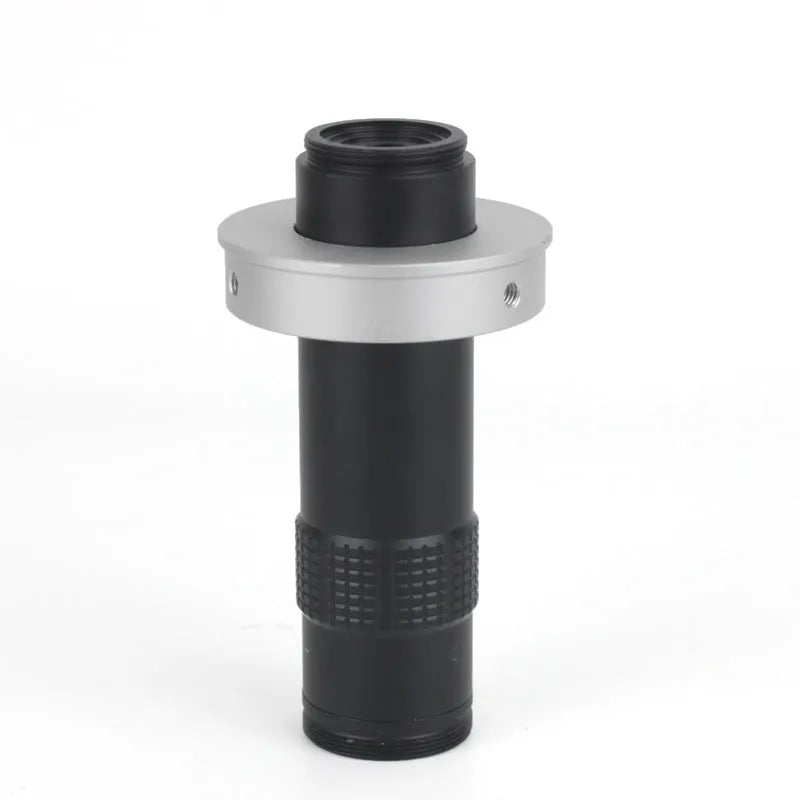Black anodised aluminium industrial camera monocular lens for high-magnification inspection.