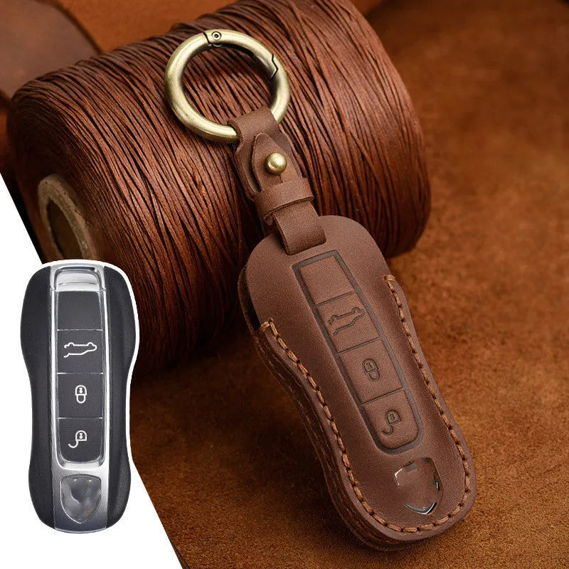 Authentic leather Porsche key cover with retro bag buckle in blue colour