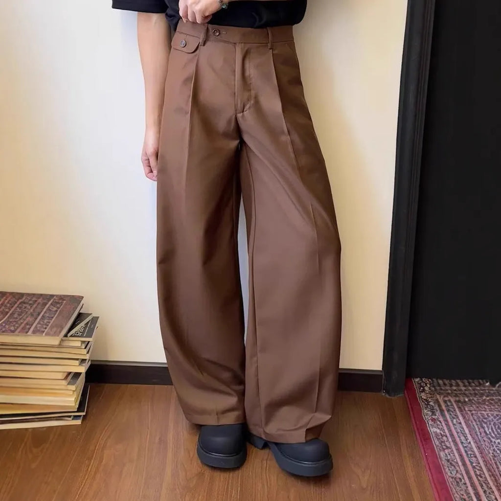 Men's brown straight-leg wide-leg casual trousers showing drape and fit