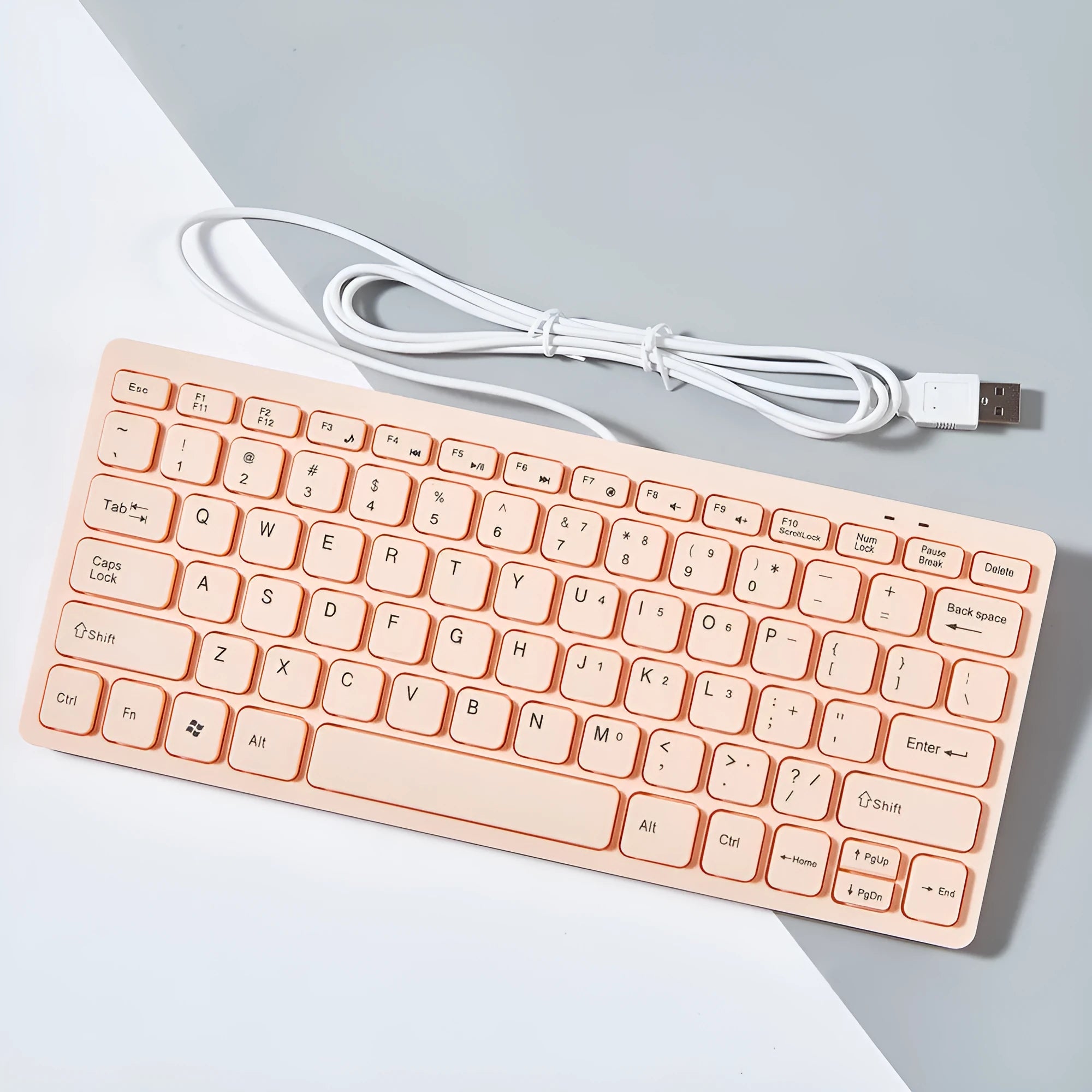 USB wired mini keyboard in four colours: black, white, pink, blue with compact design
