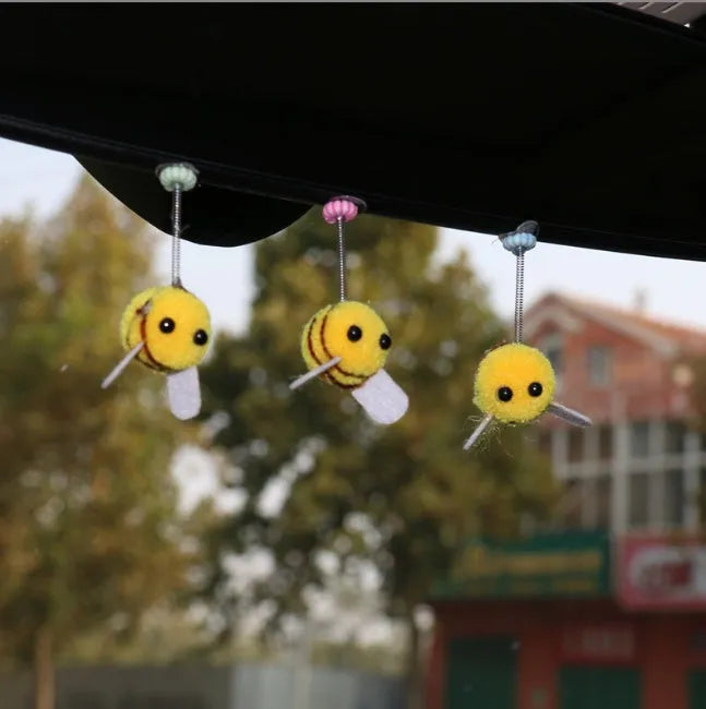 Swing spring bee car decoration made from soft fur ball material measuring 3x3cm