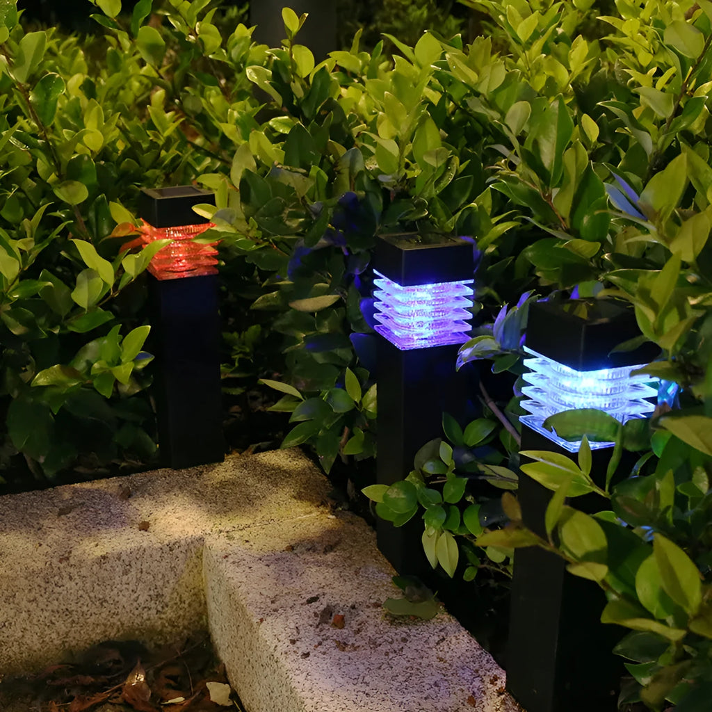 White cuboid solar-powered ground stake light for garden pathways