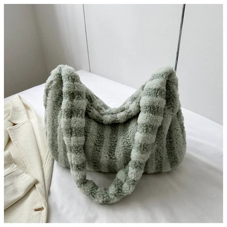 Large striped plush tote bag for women in black, green, orange, purple, or white, portable shoulder handbag.