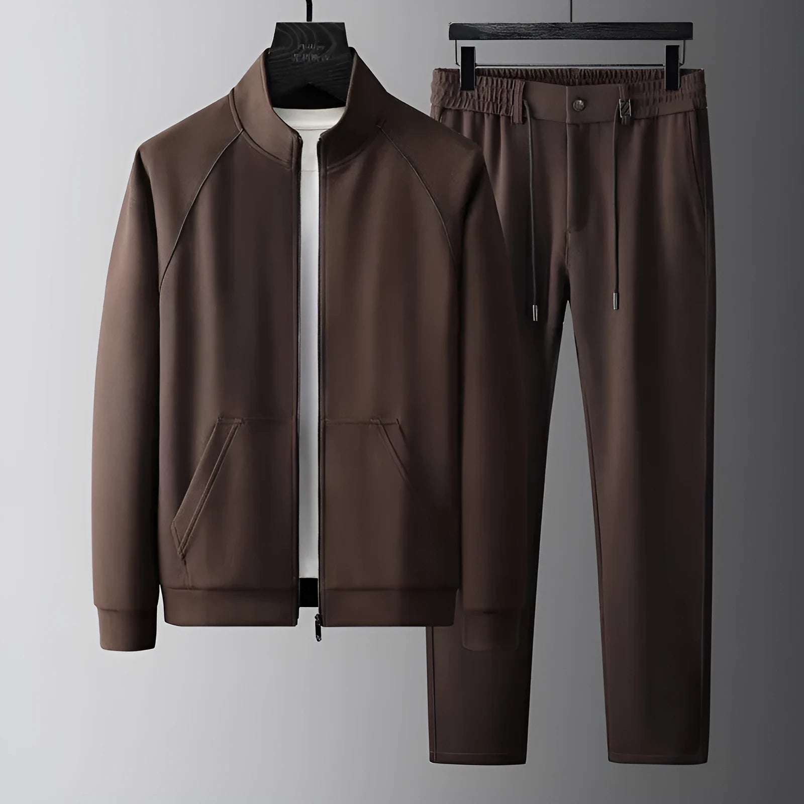 Men's slim fit stand collar sports suit set in polyvinyl alcohol fibre, shown in coffee or black colour.