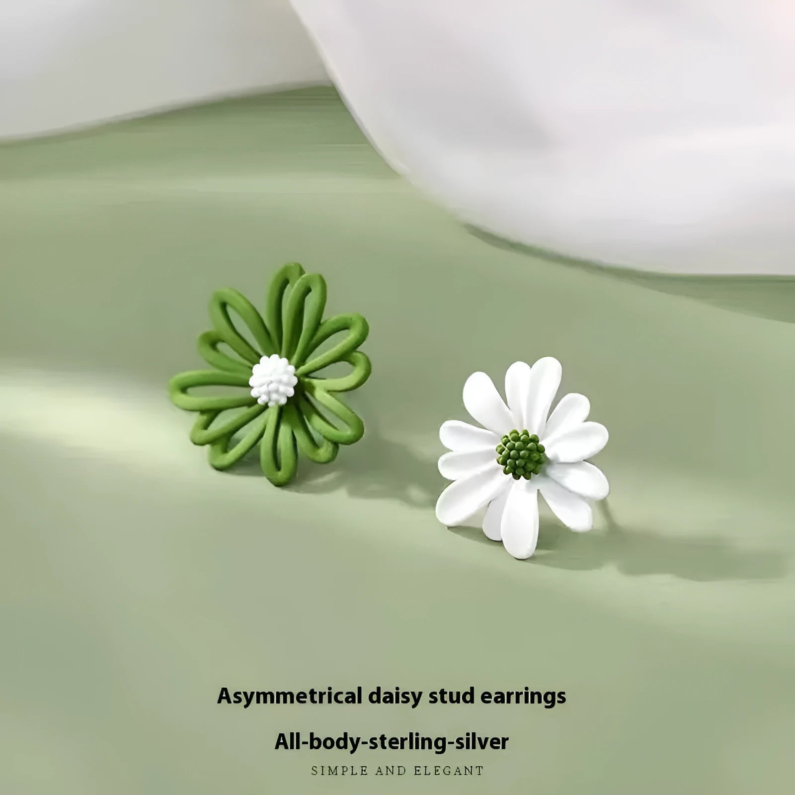 Cartoon flower earrings in alloy with blue and orange, white and green, or yellow and white two-tone colours